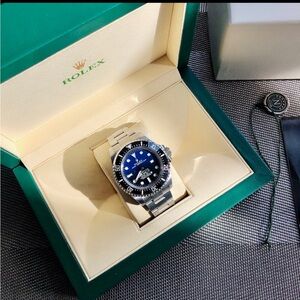 Rolex Silver and Blue Watch in Box